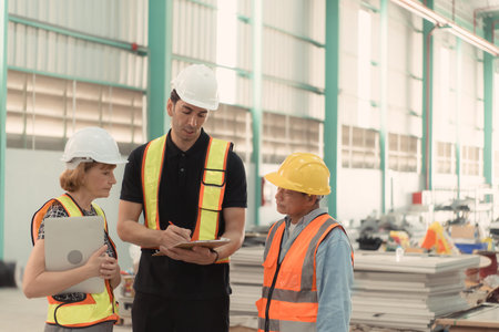 Meeting between designer and warehouse manager to organize the arrangement of product shelves in a...