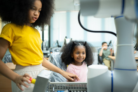 Children using the hand robot technology, Students are studying technology, which is one of the STEM courses.の写真素材