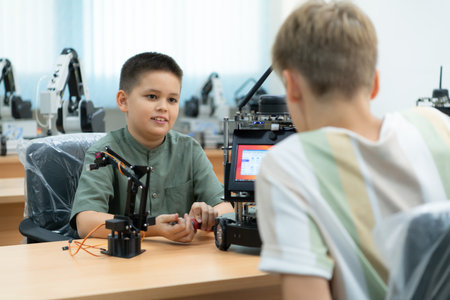 Children using the hand robot technology, Students are studying technology, which is one of the STEM courses.の写真素材