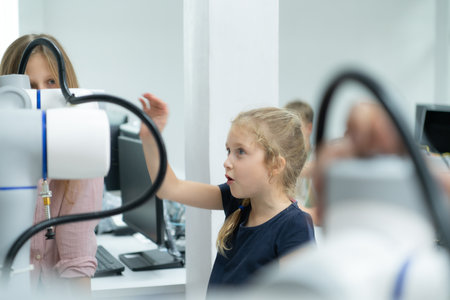 Children using the hand robot technology, Students are studying technology, which is one of the STEM courses.の写真素材