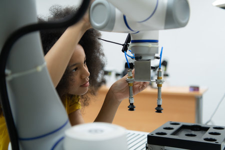 Children using the hand robot technology, Students are studying technology, which is one of the STEM courses.の写真素材