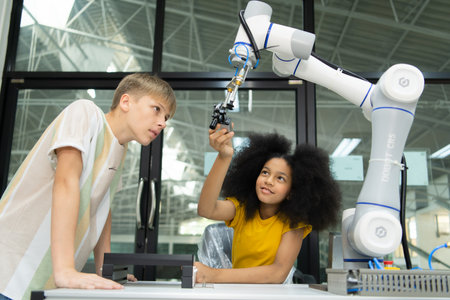 Children using the hand robot technology, Students are studying technology, which is one of the STEM courses.の写真素材