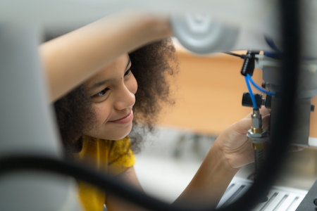 Children using the hand robot technology, Students are studying technology, which is one of the STEM...