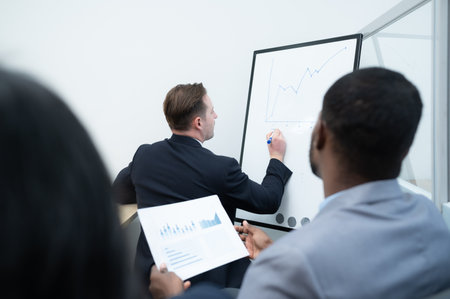 Businessmen with a meeting of the new management team with information comment finding common conclusionsの写真素材