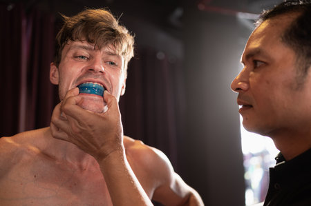 The boxer must wear a tooth collar before the fight to prevent the risk of injury from teeth...