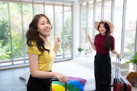 A homestay in the countryside, a natural attraction Welcome LGBT couples by cover a rainbow flag on the mattress in a bedroom overlooking natural beauty.の写真素材