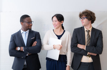Portrait of confident business team standing in office. Multiethnic group.の写真素材
