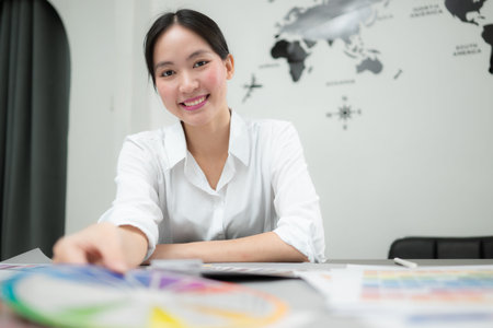Young female architect and designer are rethinking the choice of color scheme for designing a...