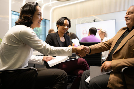 Group of diverse business people attending a meeting in a modern office.の写真素材