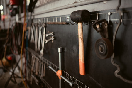 Handyman tools in car repair shop, Close-up of hammer and wrench