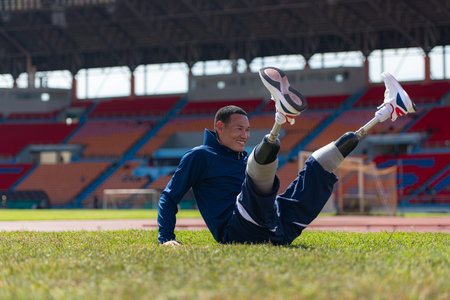 Athletes with disabilities take a break at the stadium between training sessions.の写真素材
