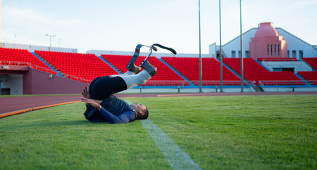Athletes with disabilities take a break at the stadium between training sessions.の写真素材