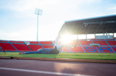 Athletes with disabilities take a break at the stadium between training sessions.の写真素材