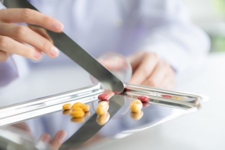 Female doctor explains medicine to patientの写真素材