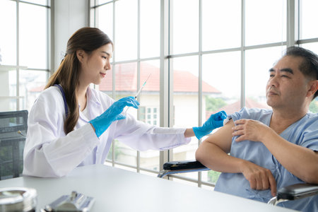 Doctor using syringe give the injection to the patient