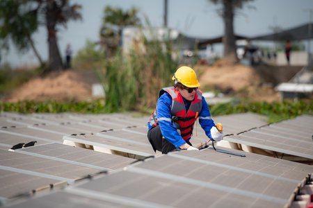 Photovoltaic engineers work on floating photovoltaics. Inspect and repair the solar panel equipment...