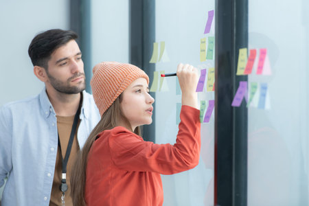 Multiethnic startup business team on meeting in modern bright office interior brainstorming, working...