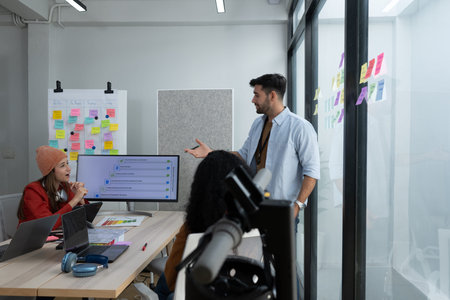 Multiethnic startup business team on meeting in modern bright office interior brainstorming, working...