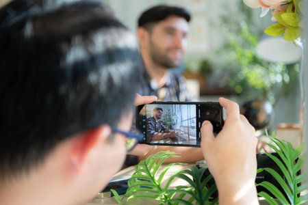 Handsome young man working on computer at home, Work from home concept.の写真素材
