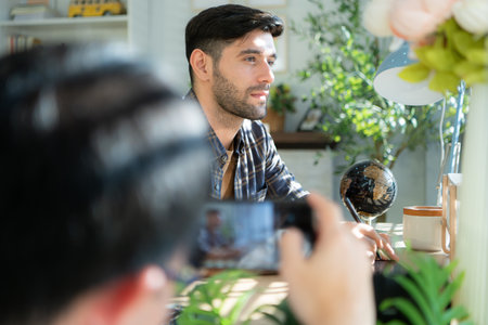 Handsome young man working on computer at home, Work from home concept.の写真素材