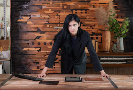 Portrait of professional businesswomen working on tablet in a modern office room