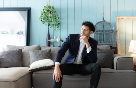 Relaxing business professionals on sofas