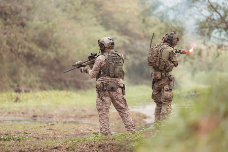 Soldiers in camouflage military uniforms carrying weapons, Reconnaissance missions in the tropical...