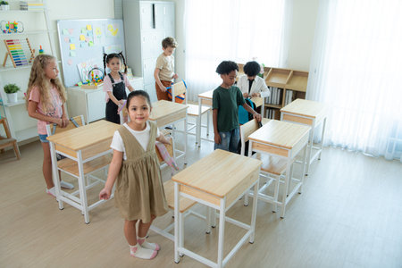 Teacher and students, In the morning to begin learning and studying in a classroom of school.の写真素材