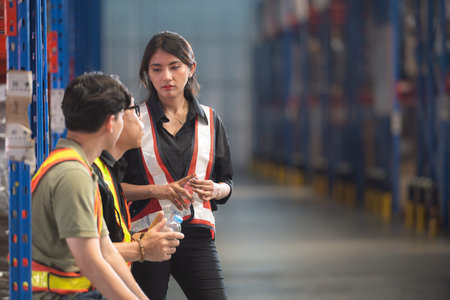 Group of warehouse employee rest comfortably during workの写真素材