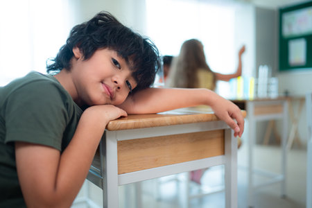 When class becomes dull. The kids started to feel tired and sleepy.の写真素材