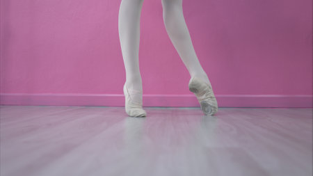 The rhythm of the legs and feet of ballet student practices ballet dancingの写真素材
