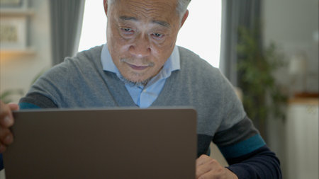 Senior businessman working from home with emotion and posturesの写真素材
