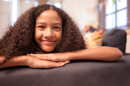Portrait of teenage girl enjoying the birthday anniversary partyの写真素材