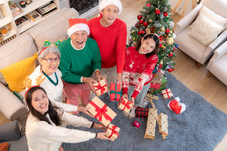 The family's gift-giving activity during Christmas at home