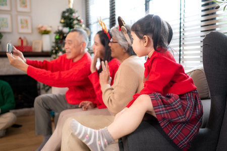 A joyful moment for a large family celebrating together at home during the Christmas season