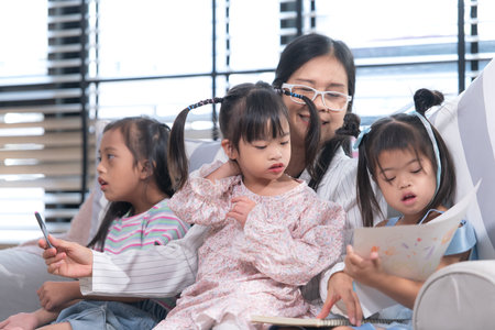 A group of special students doing learning activities in a special classroomの写真素材