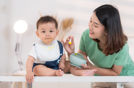 Mom and baby's breakfast timeの写真素材