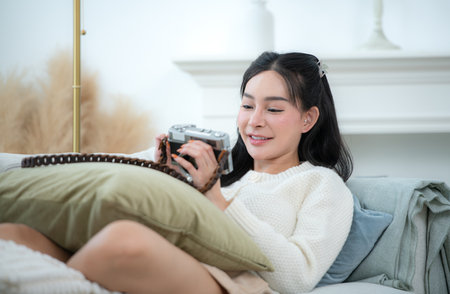 Asian young women with conducting their weekly holiday routinesの写真素材