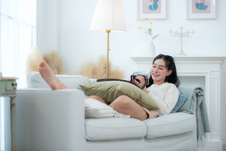 Asian young women with conducting their weekly holiday routinesの写真素材