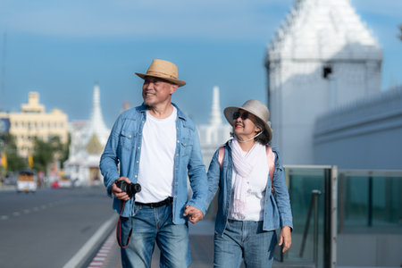 Senior couples' tourist activities around the Grand Palace and Wat Phra Kaew, Thailandの写真素材