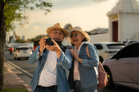 Senior couples' tourist activities around the Grand Palace, Thailandの写真素材