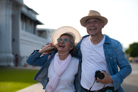 Senior couples' tourist activities around the Grand Palace and Wat Phra Kaew, Thailandの写真素材