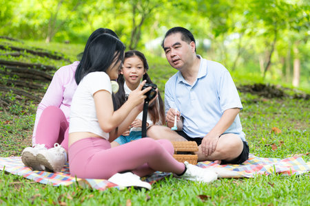 Family vacation day with outdoor activities in the parkの写真素材