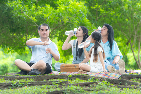 Family vacation day with outdoor activities in the parkの写真素材