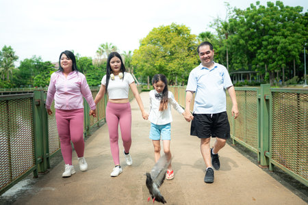 Family vacation day with outdoor activities in the parkの写真素材