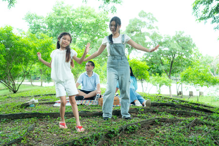 Family vacation day with outdoor activities in the parkの写真素材