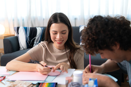 A young couple with Valentine's Day activities at homeの写真素材