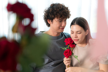 A young couple with Valentine's Day activities at home