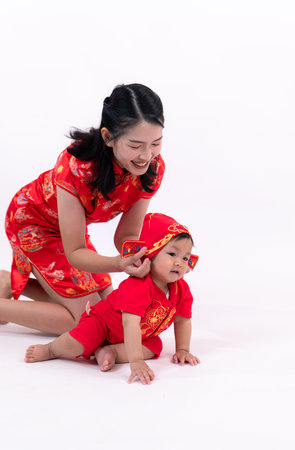 Portrait of mother and son in Chinese New Year celebration clothesの写真素材
