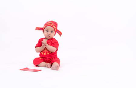 Portrait of child in Chinese New Year celebration clothesの写真素材